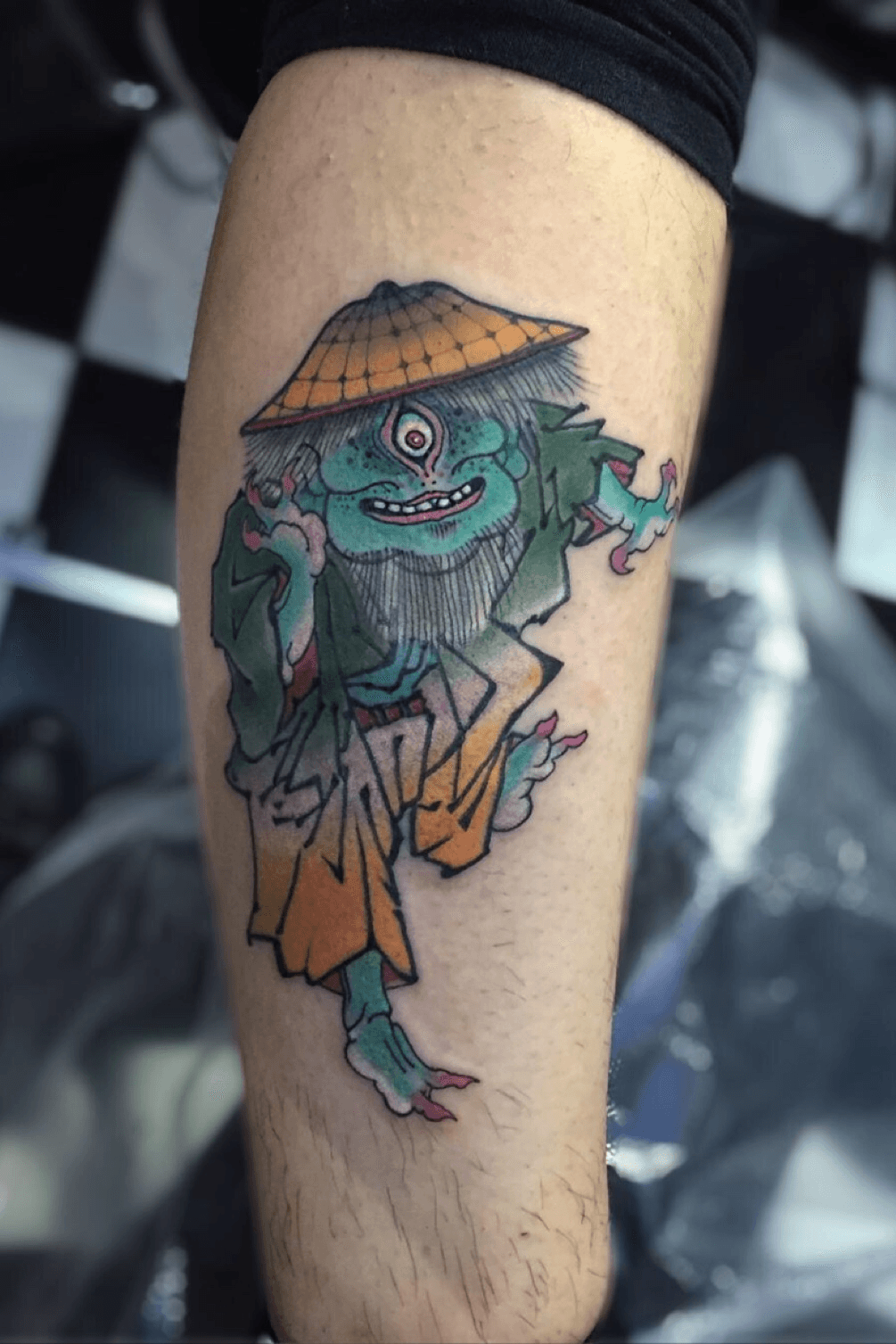 Yōkai tattoo located on the thigh traditional style