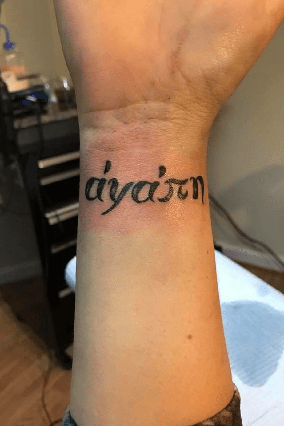 unconditional love hebrew symbol tattoo