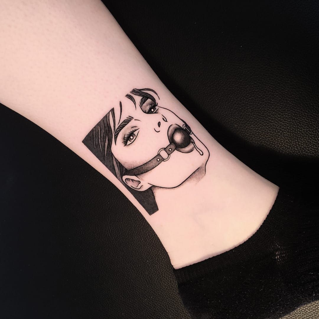 Ball gag tattoo