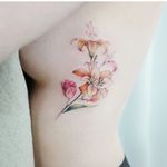 Tattoo by Banul #Banul #Seoultattoos #Seoul #KoreanArtist #color #realism #realistic #watercolor #painterly #flower #tigerlily #tulip #floral #plant #nature