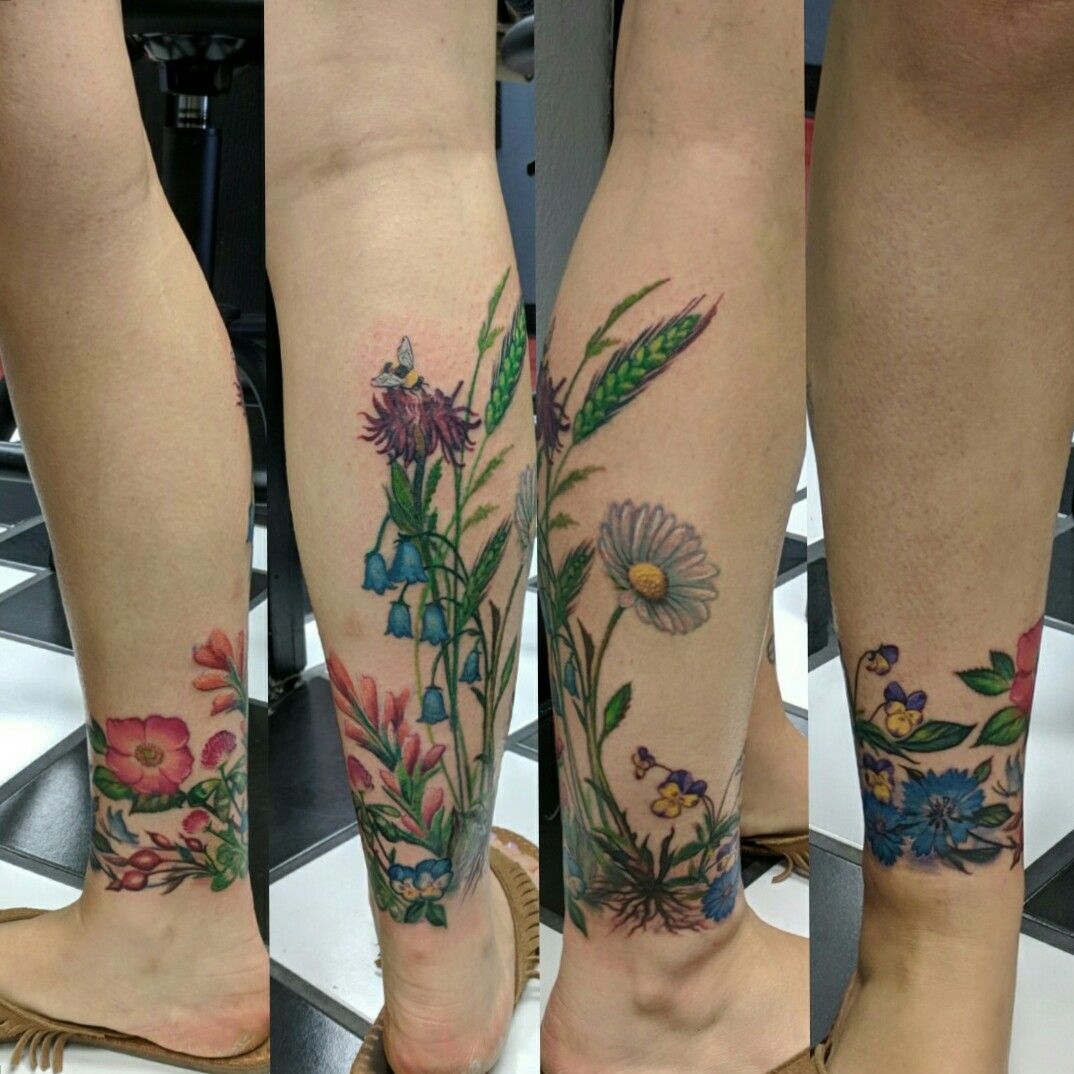 Tattoo uploaded by Brittany Smith • Wildflower leg calf piece cover up color  flower tattoo • Tattoodo
