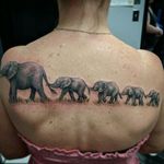 Elephant family shoulder blade back tattoo realism wildlife full color 