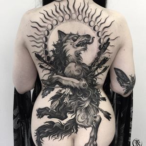 Tattoo by Kristina Darmaeva #KristinaDarmaeva #besttattoos #blackwork #illustrative #neotraditional #wolf #arrows #death #animal #moon #mooncycle #light #dog #nature #backpiece