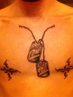 This is an old one that the armor chest piece is covering up. The nipple tats were my first tattoo, they also are being covered.
