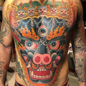 Tattoo by Chad Koeplinger #ChadKoeplinger #besttattoos #yama #hindu #god #deity #death #thirdeye #mystical #skeletons #skulls #fire #horns #chestpiece #stomachtattoo