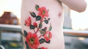 Red camellias inlaid on the side by SION (@tattooistsion) #flowertattoo #floraltattoo #Korea #camellia #KoreanArtist #tattooistsion #colortattoo #flower #flowers #oriental 