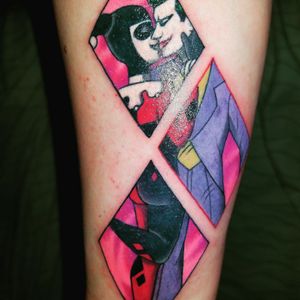 Tattoo by trevor "harley quinn and joker" 4th panel is harley holding a bomb behind her back. Ill get it, along with the date, whenever i get married