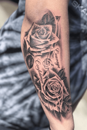 Black and grey roses and script “courage and Confidence”
