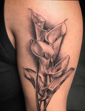 Calla lillys for my client upon request. I love doing organic subjects and any type of plant. Contact me at 510 598 0925.tattooing out of hayward california in the bay area.