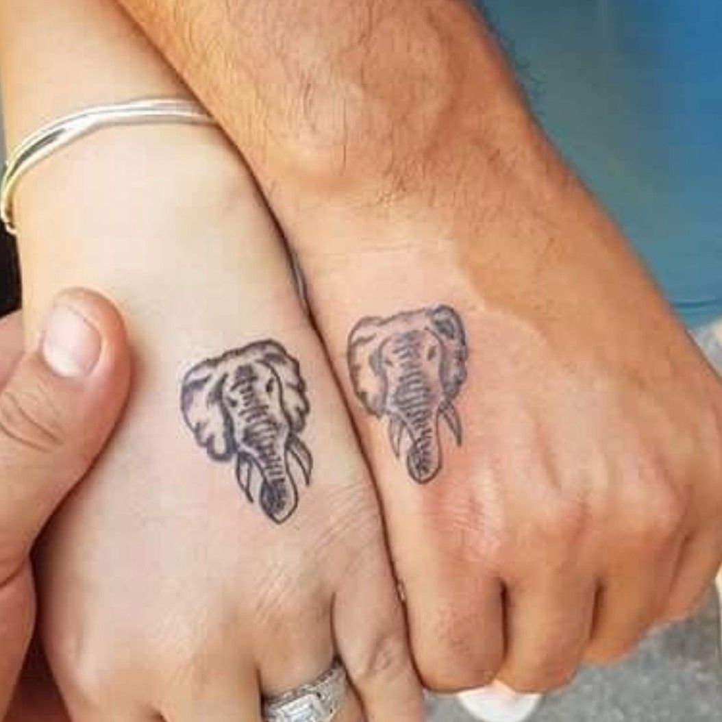 Black Outline Baby Elephant Tattoo On Finger