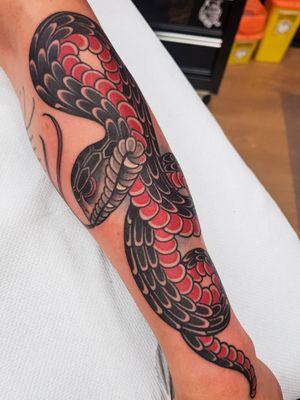Done by Honour Indeed Tattoo StudioTraditional snake tattoo based in japanese Irezumi style