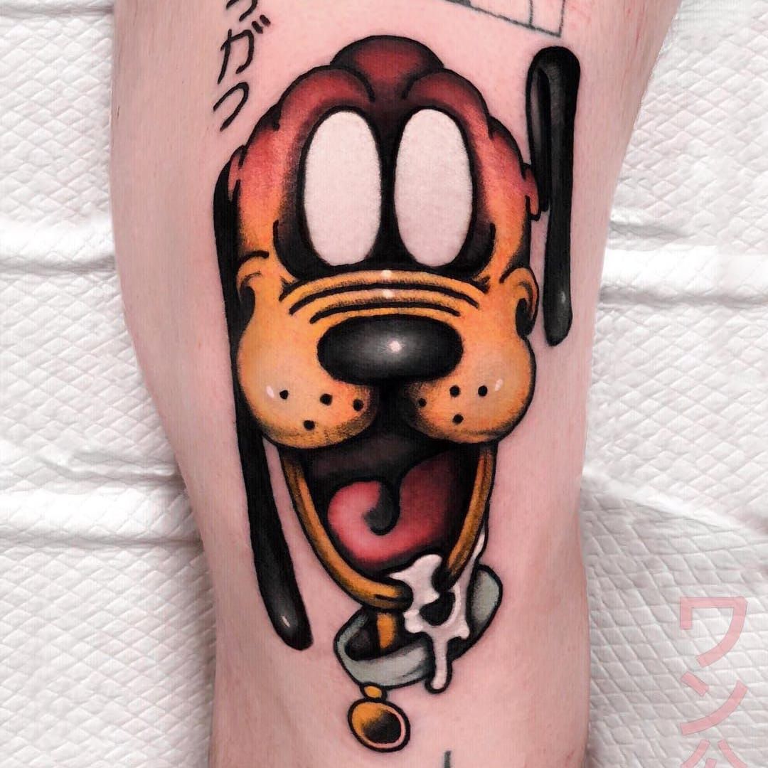 Goofy tattoo on the ankle