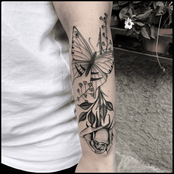 Tattoo uploaded by Alex Palleschi  Tattoo I got of a blue Monarch Butterfly  with a cross in the middle It says God has you in his arms I have you in