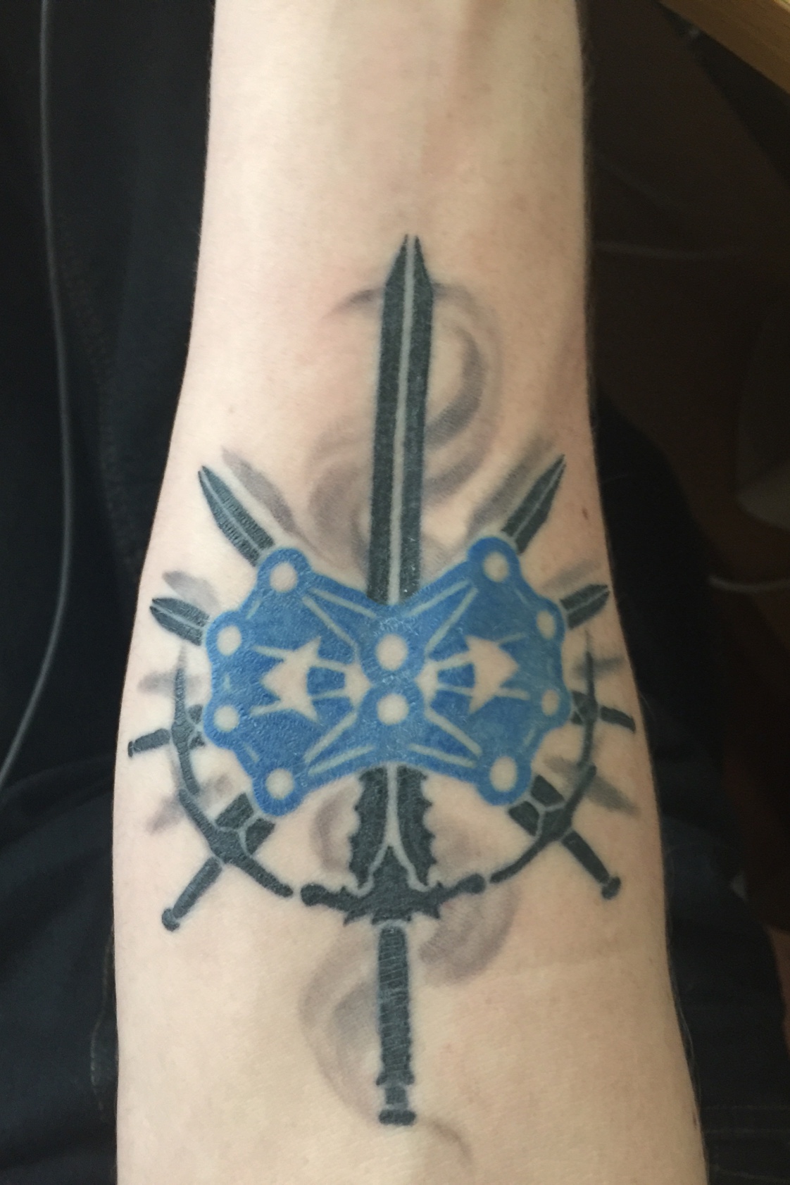 Tattoo of variant on knights radiant symbol : r/Stormlight_Archive