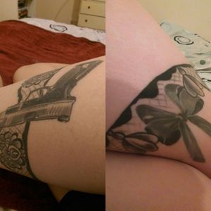 Garter with gun on right side of right thigh with bow on the back 