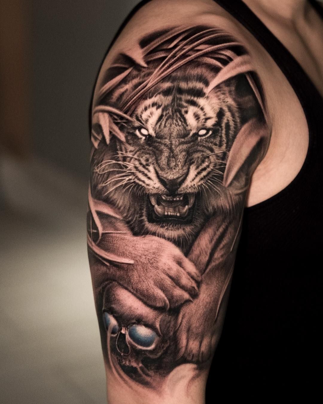 Microrealistic tiger tattoo on the forearm