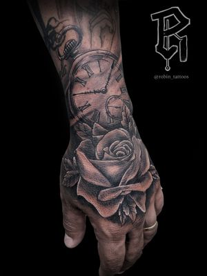 Rose with pocket watch#handtattoo #rosetattoo #pocketwatchtattoo #blackandgraytattoo #tattooartists 
