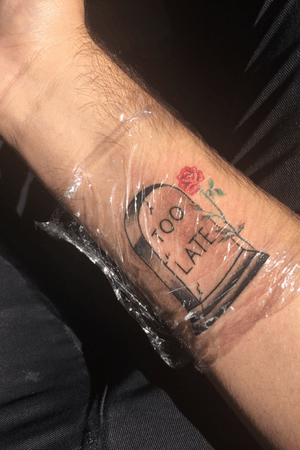 Combination piece of a tombstone and the beauty and the beast rose I got. #beautyandthebeast #beauty #rose #rosestattoo #Tombstone #TombstoneTattoo #tattooart 
