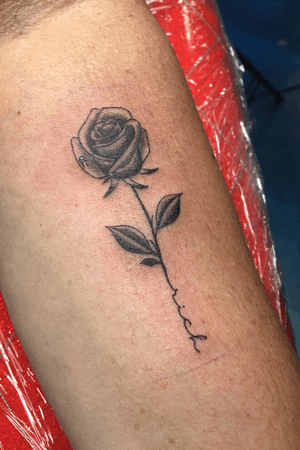 Rose w/ stem transform into her husbands name. Im loving memory tattoo. #bnginksociety #inlovingmemory #rose #lettering #empireinks #vitalitree #fkirons #hawaii #texas #dfw #dallas #fortworth #arlington #tattoo #tattoos #tattooed #tattooformen #tattooforwomen #tattoosformen #tattoosforwomen #inked #inkedup #blackandgray #artist #tattooideas #tattooist #tattoostyle #tattooer #tattoodesign #tattooartist #tattooart #tattoolife #art #bodymod #bodymods #bodymodification #artwork #artsy #arte #artoftheday #artistic #ideas #idea #tat #tatted
