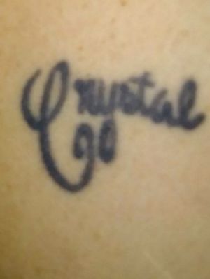 This was my second tattoo. It's been here on my chest over my heart for 21 years. My brother's first serious girlfriend Crystal commited suicide she shot herself while on the phone with him. It was one tragity in a life of way to many...it was done in Olympia Wa at one of downtowns orginal tattoo parlors, Electric Rose Tattoo Parlor.