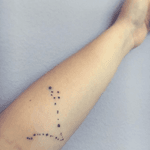 tattooed the starsign PISCES on the forearm of a NICE GIRL.