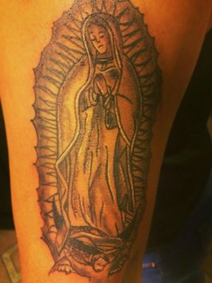 Virgin Mary on upper forearm