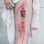 lotus flower norigae embroidered along the side of her leg *Norigae= Korean traditional ornaments. #flowertattoo #floraltattoo #Korea #KoreanArtist #tattooistsion #colortattoo #flower #flowers #oriental #norigaetattoo 