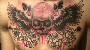Traditional Skull and Wings with some roses, one more sessions and we are finished ! 