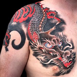 Tattoo by Aaron Bell #AaronBell #JapaneseTattoo #Japaneseinspired #Japaneseinspiredtattoo #Japanesestyle #Japanese #dragon #legend #mythicalcreature #smoke #color #fire