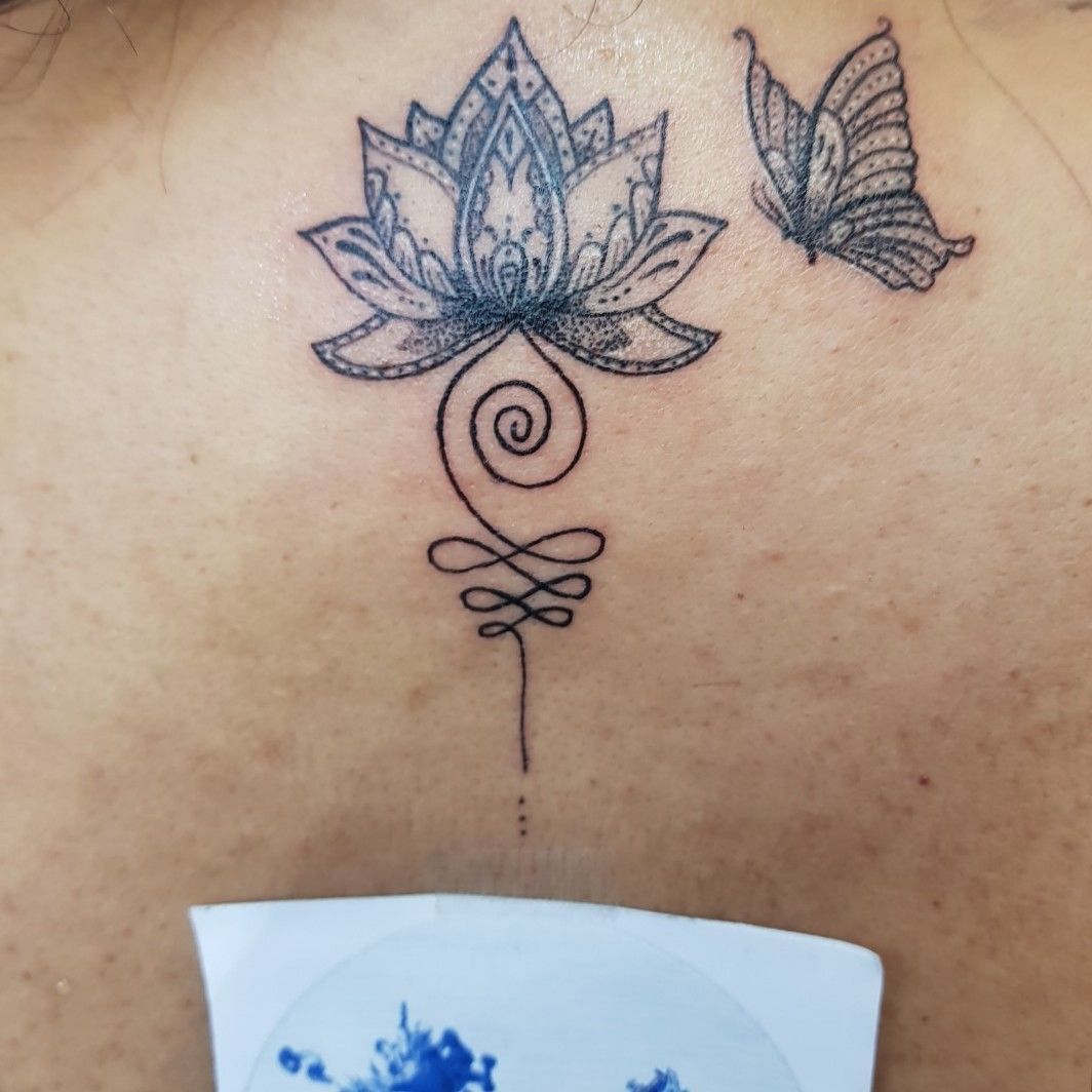 Tattoo uploaded by Blue ink tattoo • Unalome, flor de loto y mariposa ??  @rafa.blueinktattoo en Instagram #blueinktattoo #blueinktattoooficial # tatuajes #tattoo #ink #inktattoo #eternalink #intense #tatuajespuebla  #rotarymachine #unalometattoo #loto ...