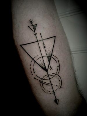 Geometric arrow tattoo