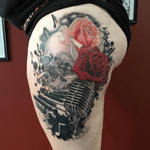 This kind of has a rockabilly feel to it. I really enjoyed doing this tattoo! #skull #roses #flowers #music 