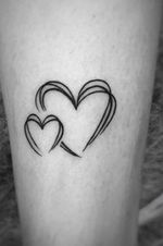 Beautiful freehand 2 fine lines work Hearts as symbol for Mother and child or more
