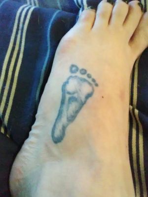My son's footprint on my left foot