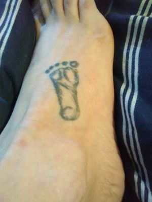 My daughter's footprint on my right foot