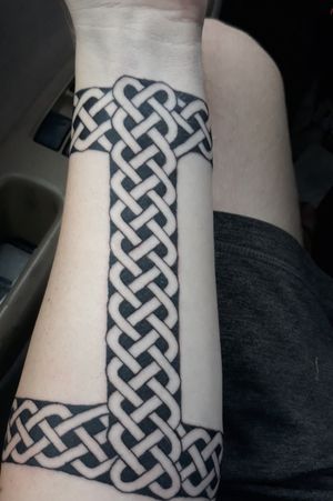 Celtic weave forearm tattoo 