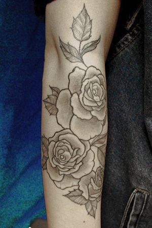 Ornamental roses on arm