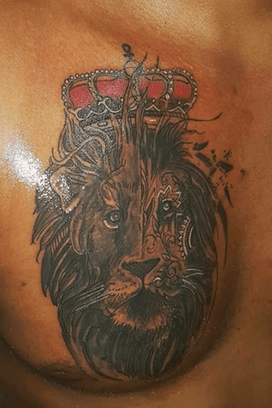 Custom lion chest tattoo 