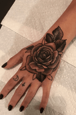 Rose on back of hand. 