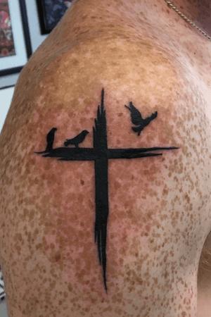 This is a memorial tattoo i got for my brother. My last name is crow and theres three siblings. The two in the left are me and my sister and the flying one represents my brother in heaven.