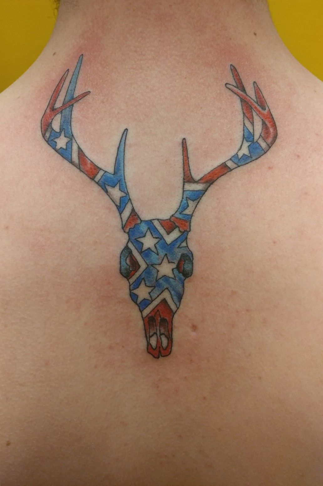 rebel flags with deer tattoo