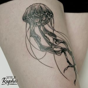 Girl upper tight jellyfish tattoo