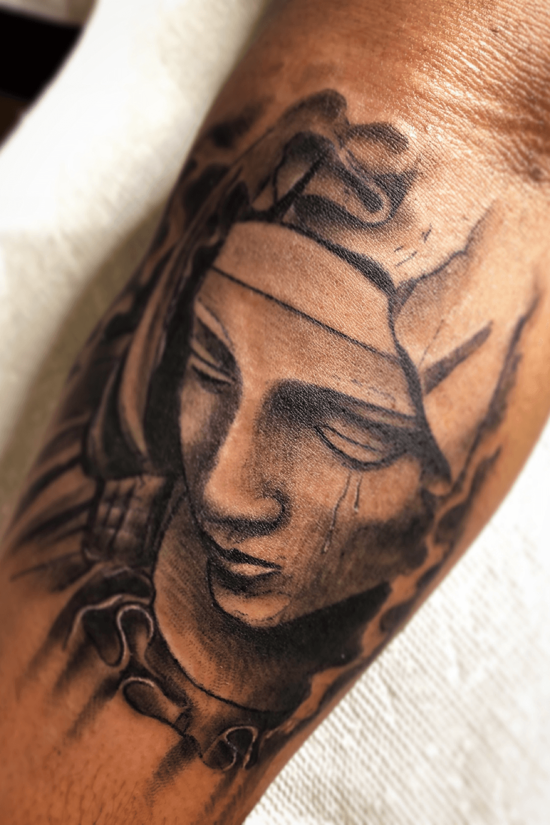 virgin mary face tattoo designs