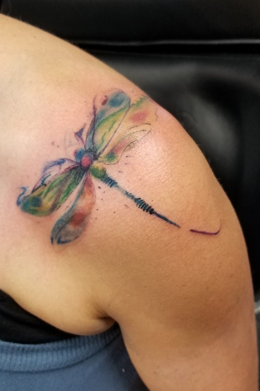 My new dragonfly tattoo done by Jia aka pawtattoo in San Mateo Excuse  my angry skin I love it   rTattooDesigns