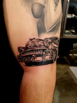 Black and grey portrait of a Cadi Lowrider by Ashkon at Club Tattoo in The Linq Hotel, Las Vegas. 