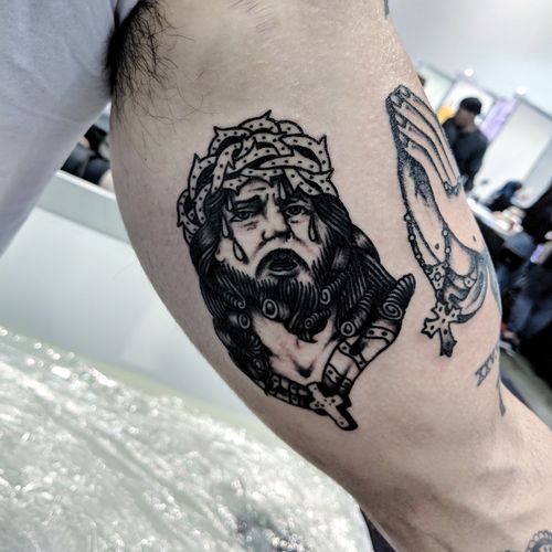 Always keen to tattoo religious icons Thanks 🙏🙏🙏 Back in Melbourne and responding to bookings for the next couple of weeks before Sydney.  I'll be getting back to Sydney bookings this week also 🔥🔥🔥 @fhctattoo @fhctattoo @fhctattoo . . . . . . . . . . . . . #blacktraditionals #blacktattoo #black #jesus #tradtattoo #traditionalbangers #traditionaltattoo #trad #tattoomelbourne #tattoo #rustictraditionaltattoo #oldlines #oldschooltattoo #classictattoo #melbournetattoo #austrad
