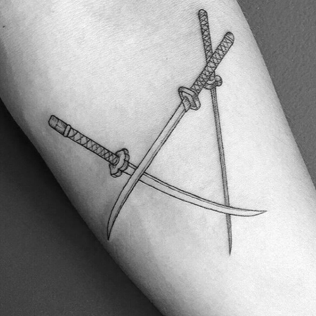 First tattoo had to get zoros swords  rOnePiece