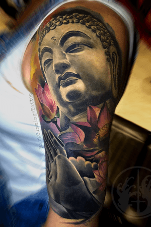 Buddha tattoo finaly finished. Everything healed except for some background and small flowers