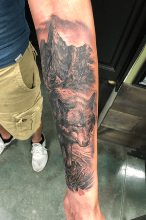 Got this done in tbe spring and hope to finish by years end. This tattoo represents my love for nature and animals and the wolf being my favorite. 