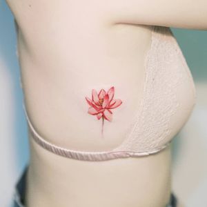 Tattoo by Sion #Sion #TattooistSion #tinytattoo #tiny #smalltattoo #small #flower #floral #lotus #watercolor